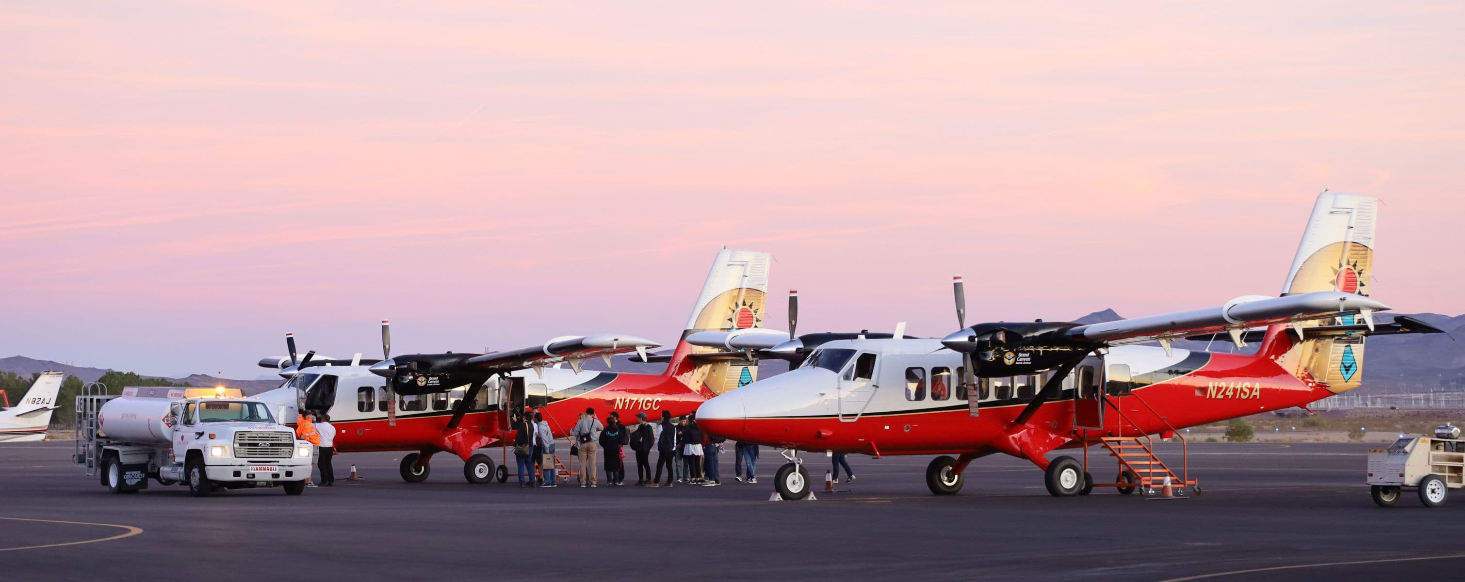 Two Twin Otters landed in Boulder City at sunset