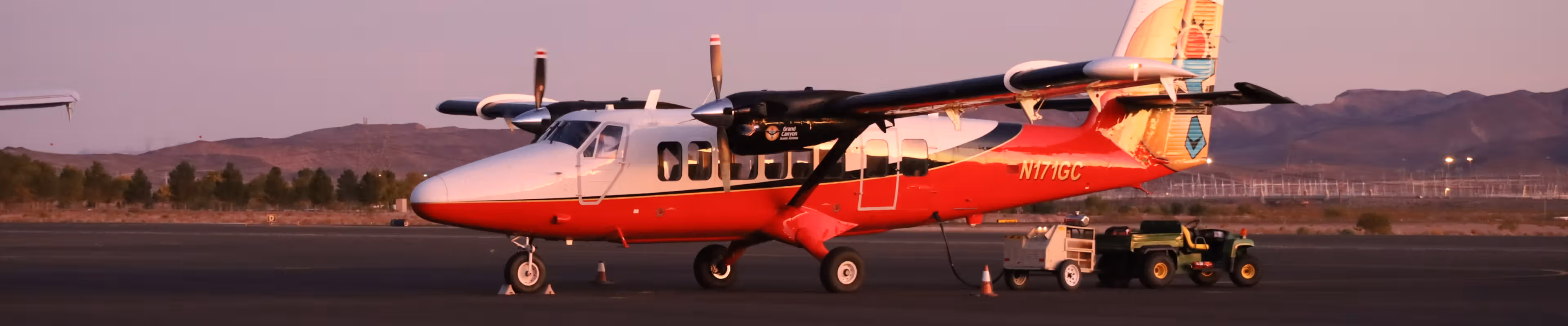 Sunset at Boulder City airport with airplane
